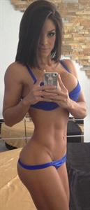 Michelle Lewin in a bikini taking a selfie