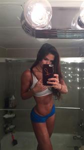 Michelle Lewin in a bikini taking a selfie