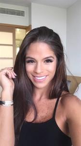 Michelle Lewin in a bikini taking a selfie