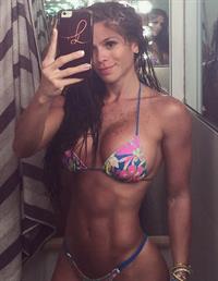 Michelle Lewin in a bikini taking a selfie