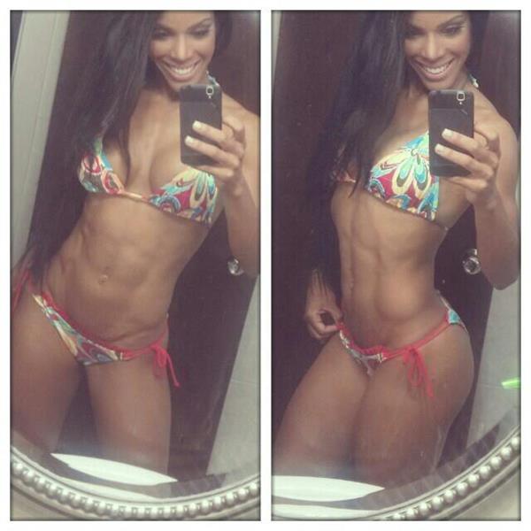 Yarishna Ayala Otero in a bikini taking a selfie