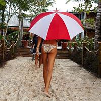 Adriana Lima in a bikini - ass