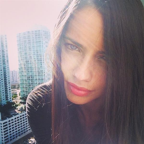 Adriana Lima taking a selfie