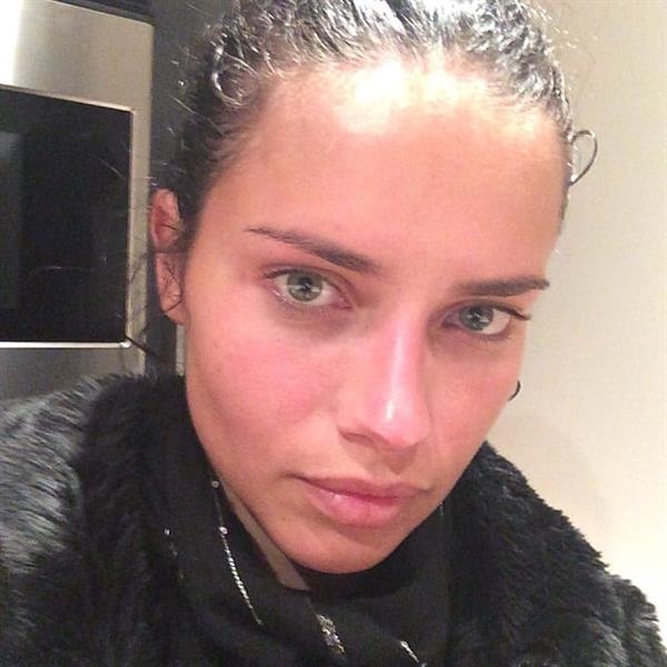 Adriana Lima taking a selfie