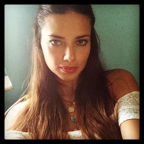 Adriana Lima taking a selfie