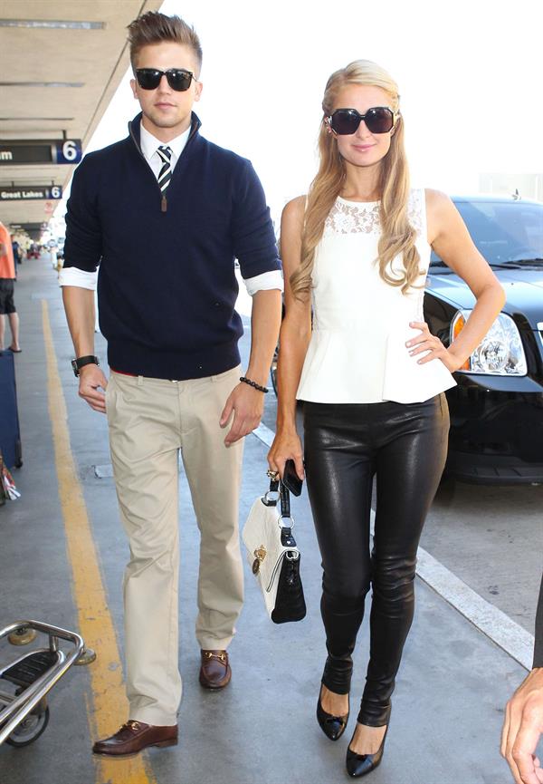 Paris Hilton Arrives at LAAirport in Los Angeles (September 6, 2013) 