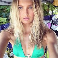 Romee Strijd in a bikini taking a selfie