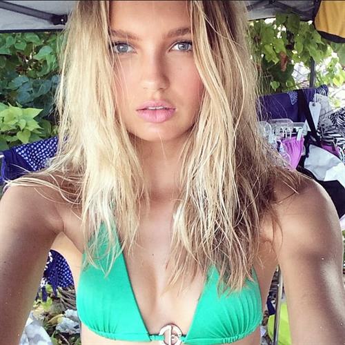 Romee Strijd in a bikini taking a selfie