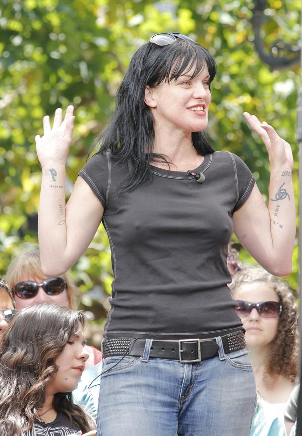 Pauley Perrette on the set of Extra in LA 5/28/13 
