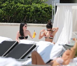 Selena Gomez in bikini by a hotel pool in Miami 5/11/13 