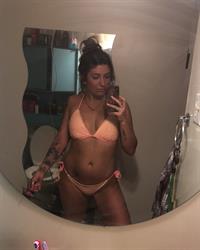 Anonymous in a bikini taking a selfie