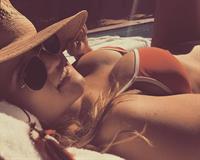 Emily Osment sexy big boobs.