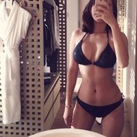 ohttomom in a bikini taking a selfie