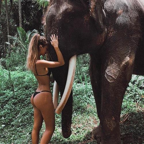 Pauline Tantot in a bikini - ass