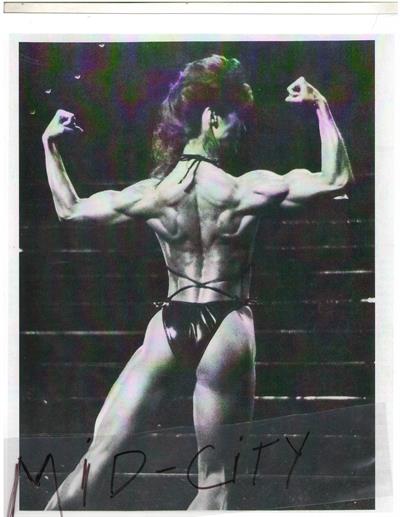 Rachel McLish in a bikini - ass