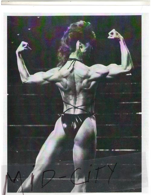 Rachel McLish in a bikini - ass