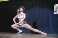 Rachel McLish in a bikini