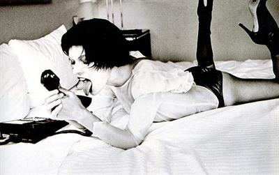 Milla Jovovich in lingerie - ass