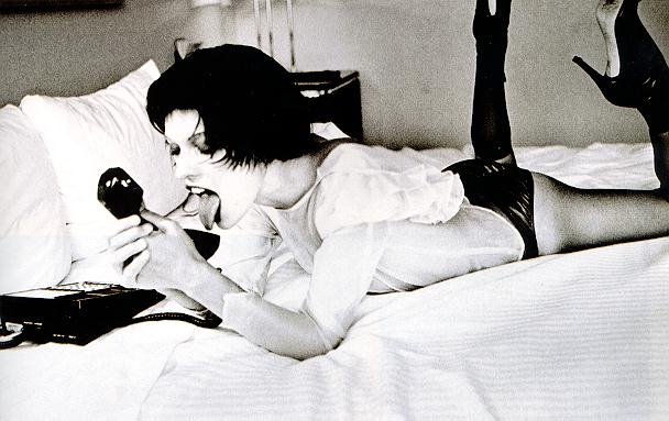 Milla Jovovich in lingerie - ass