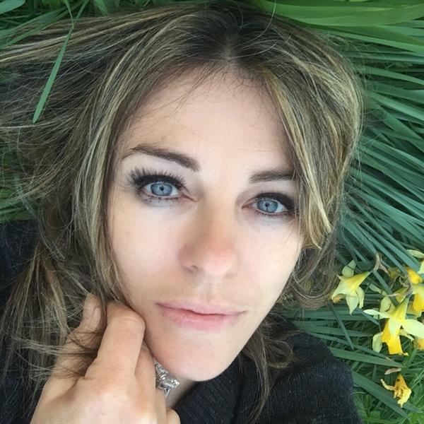 Elizabeth Hurley taking a selfie