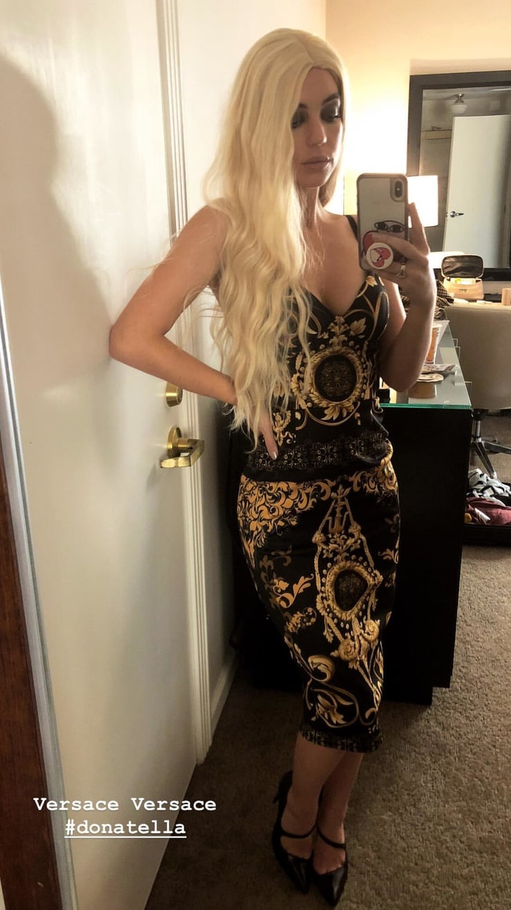 Adelaide Kane taking a selfie