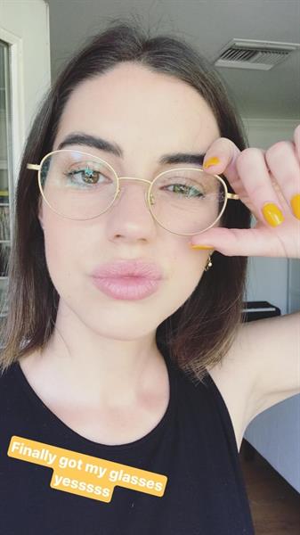 Adelaide Kane taking a selfie