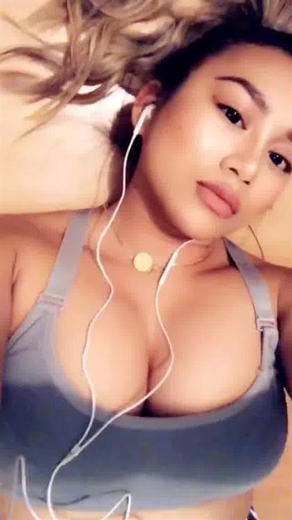 Anonymous in a bikini taking a selfie