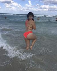 Riley Ticotin in a bikini - ass