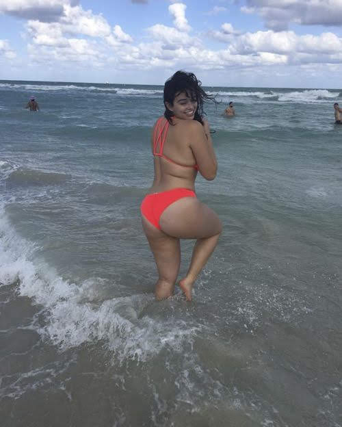 Riley Ticotin in a bikini - ass