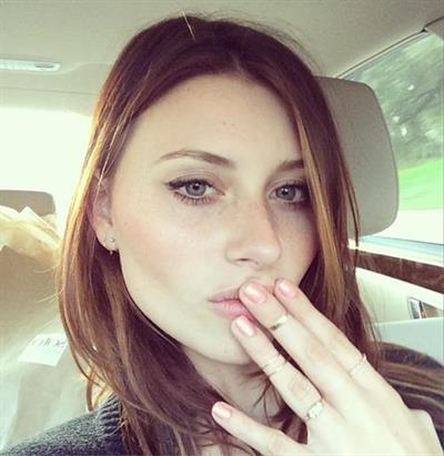 Aly Michalka taking a selfie
