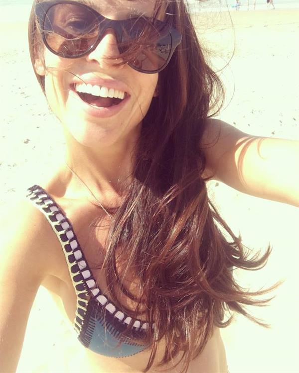 Ann Van Elsen in a bikini taking a selfie