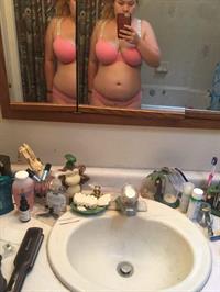 Stephanie Elliott in lingerie taking a selfie