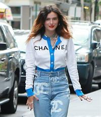Bella Thorne braless tits seen by paparazzi showing her pierced nipple dressed all in Chanel.






