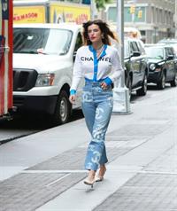 Bella Thorne braless tits seen by paparazzi showing her pierced nipple dressed all in Chanel.






