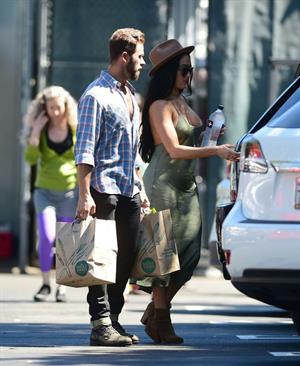 Nikki Bella braless boobs in a green dress seen by paparazzi.
















