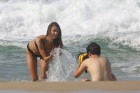 Alessandra Ambrosio sexy ass bikini body seen by paparazzi at the beach.

