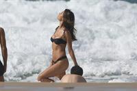 Alessandra Ambrosio sexy ass bikini body seen by paparazzi at the beach.

