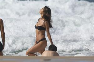 Alessandra Ambrosio sexy ass bikini body seen by paparazzi at the beach.


