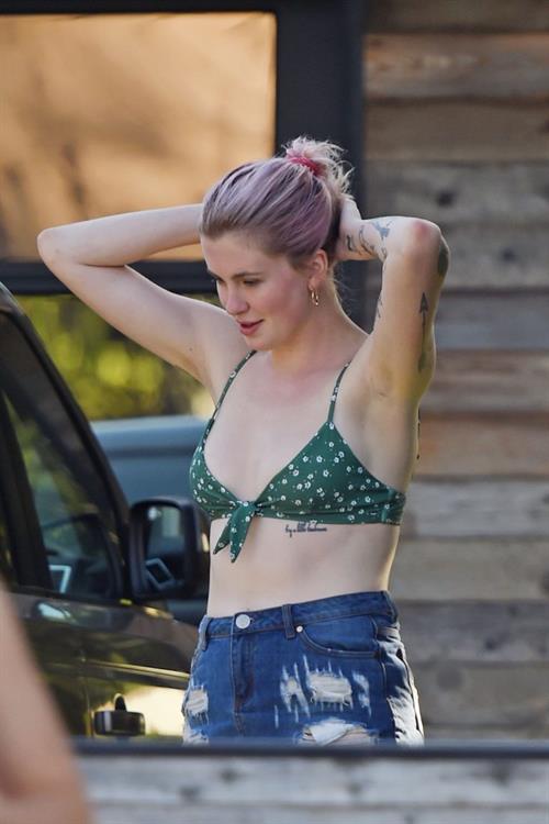 Ireland Baldwin Pictures Ireland Baldwin sexy in a bikini top seen by paparazzi showing some nice cleavage.