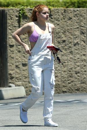 Ariel Winter areola peek in a sexy bikini top seen by paparazzi buying liquor.









