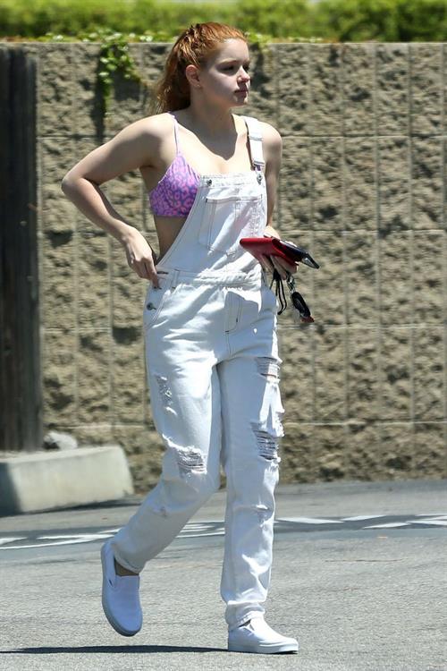 Ariel Winter Pictures Ariel Winter areola peek in a sexy bikini top seen by paparazzi buying liquor.