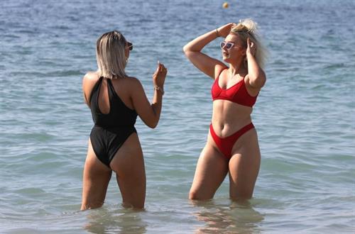 Tallia Storm Bikini Pictures Tallia Storm sexy in a red bikini seen by paparazzi at the beach.
