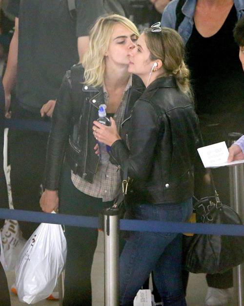 Cara Delevingne and Ashley Benson kissing at the airport.






















