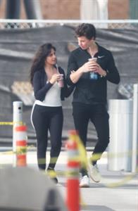 Camila Cabello looking sexy seen in public with Shawn Mendes by paparazzi.




