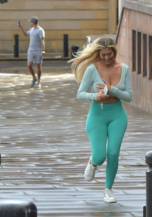 Chloe Ferry Pictures Chloe Ferry braless tits pokies in a tight blue outfit showing off her ass and boobs seen by paparazzi.