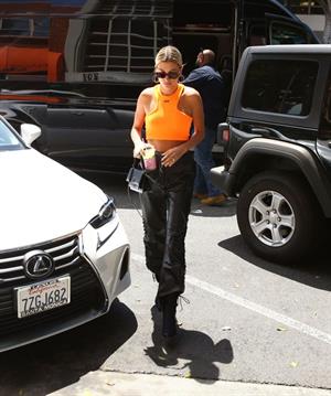 Hailey Bieber braless tits pokies seen by paparazzi in a halter top.





