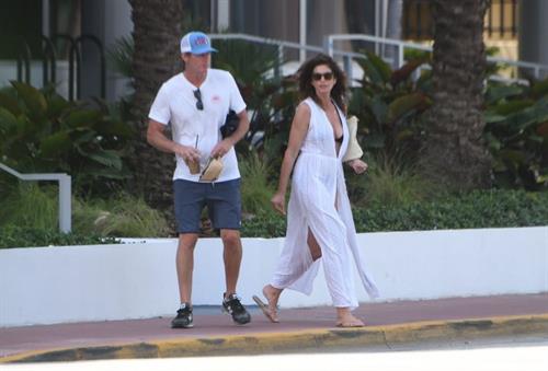 Cindy Crawford Pictures Supermodel Cindy Crawford in a sexy bikini showing nice cleavage seen by paparazzi.