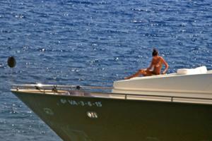 Francesca Sofia Novello caught topless by paparazzi tanning with her nude boobs exposed.
