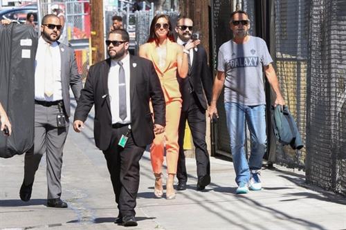 Alex Morgan braless and sexy in a orange jacket seen by paparazzi.








