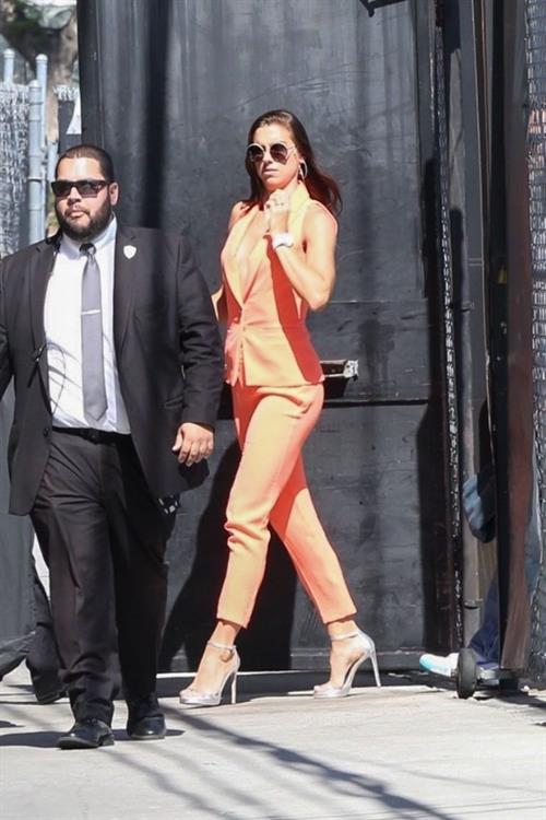 Alex Morgan braless and sexy in a orange jacket seen by paparazzi.








